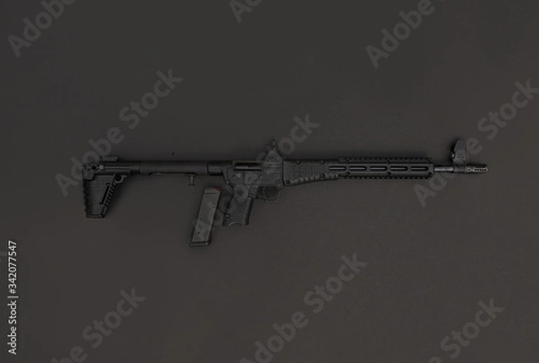 Obraz gun on black background