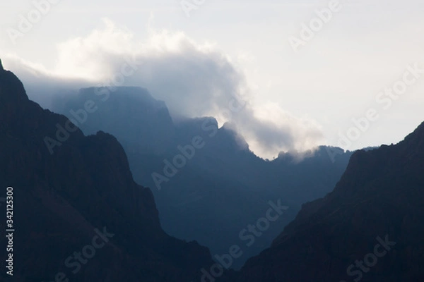 Obraz Distant mountain with clouds outdoors