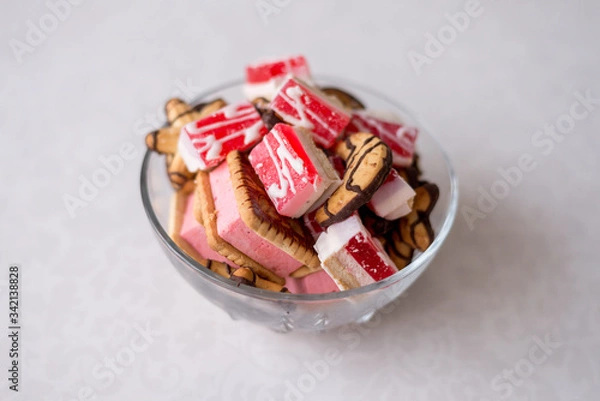 Obraz sweets in a bowl on a white background
