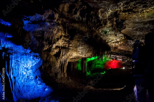 Fototapeta cave with rock growths with illumination