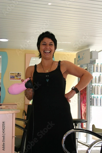 Fototapeta sourire d'une coiffeuse