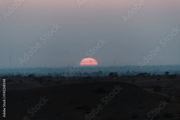 Fototapeta Sunset as seen from above the hill at Wankaner, Gujarat, India