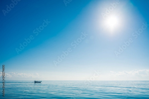 Obraz Boat sailing in the sun through the Arabigo Sea in the direction of Masirah Island, Oman