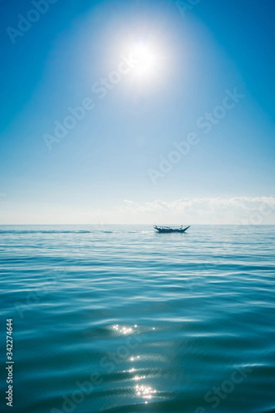 Obraz Boat sailing in the sun through the Arabigo Sea in the direction of Masirah Island, Oman