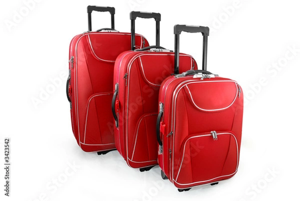 Obraz Three red travel suitcases (trolley) - isolated