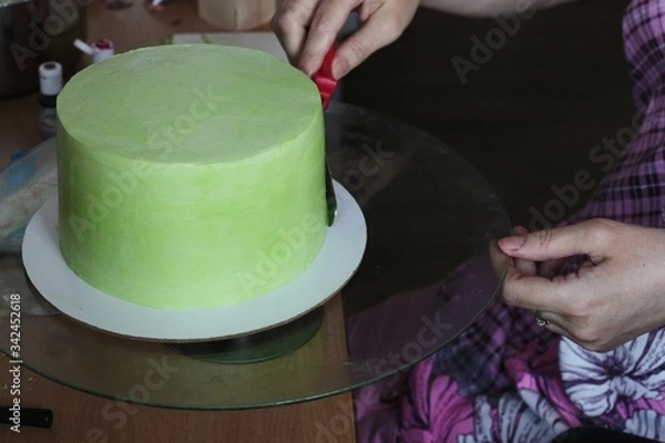 Fototapeta Cake in the process of cooking macro 