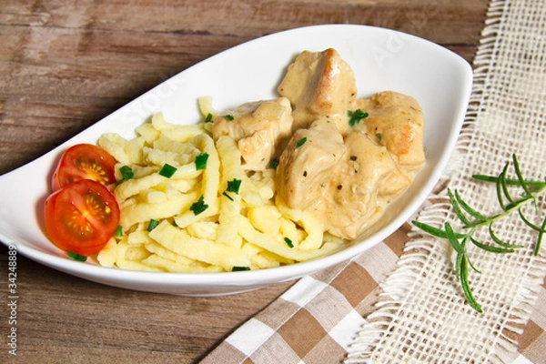Fototapeta Putenragout mit Spätzle