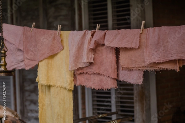 Obraz authentic house, villa in rural Balinese, with natural decor, in the form of drying fabrics on the terrace