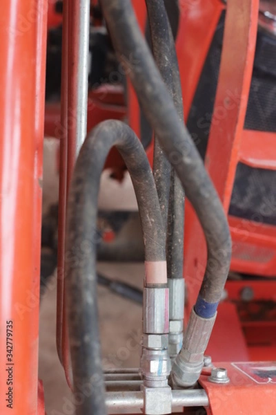 Obraz red valve on a factory