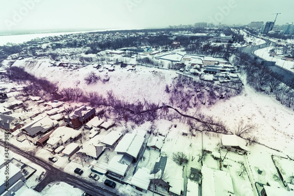 Obraz top view on buildings, winter 