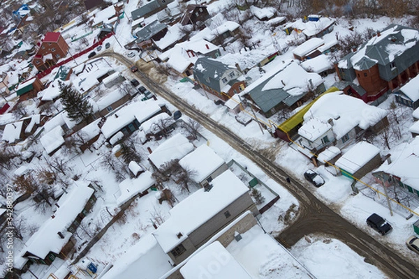 Obraz top view on buildings, winter 