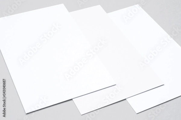 Fototapeta Top view of blank business cards isolated on grey as template for design presentation
