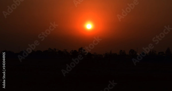 Obraz Sunset view with orange sky