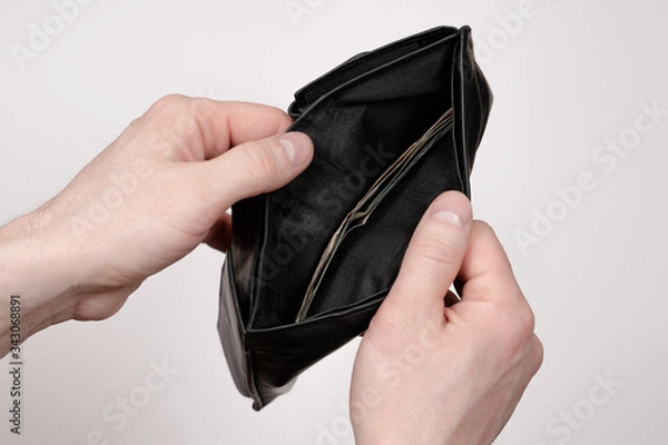 Fototapeta hands holding a wallet, opened a wallet