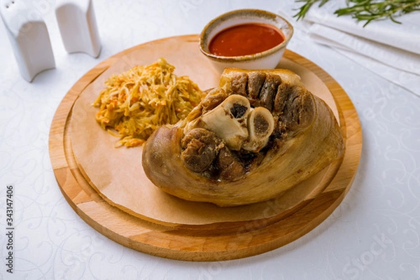 Obraz Pork knuckle fried on white table