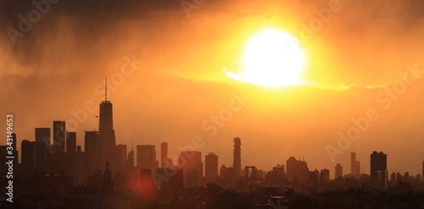 Obraz A beautiful, dramatic sunset over NYC