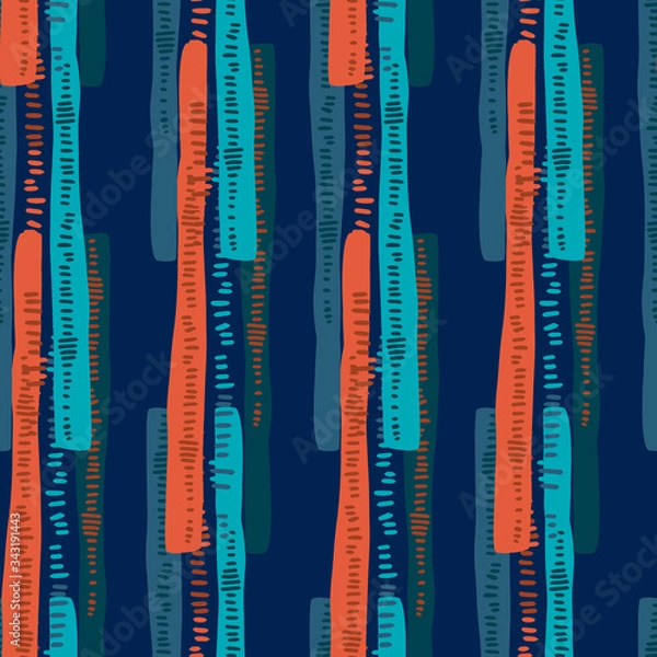 Fototapeta Abstract vector seamless pattern of colorful vertical stripes with lines on a dark blue background. The design is suitable for textiles, surfaces, clothes, backgrounds, wallpaper