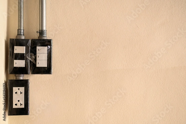 Obraz Electrical switch and plug on wall