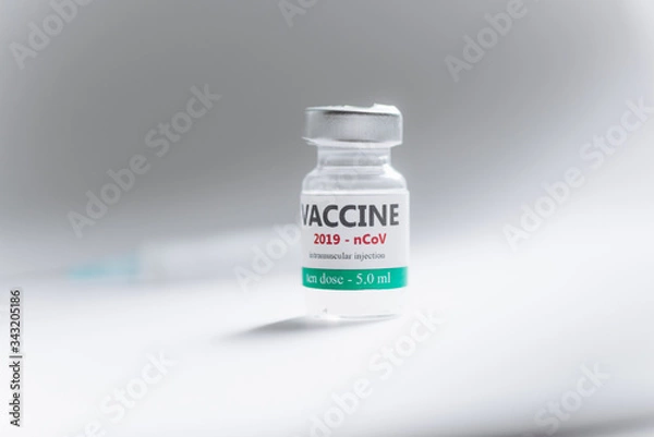 Fototapeta Vaccine bottle and syringe injection. It use to prevention,immunization and treatment for new corona virus infection novel coronavirus 2019 or nCoV 2019 from Wuhan .Medical infectious disease concept.
