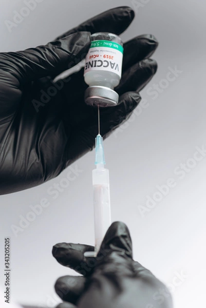 Fototapeta Vaccine and syringe injection. It use for prevention, immunization and treatment from corona virus infection novel coronavirus disease 2019, Covid-19 .