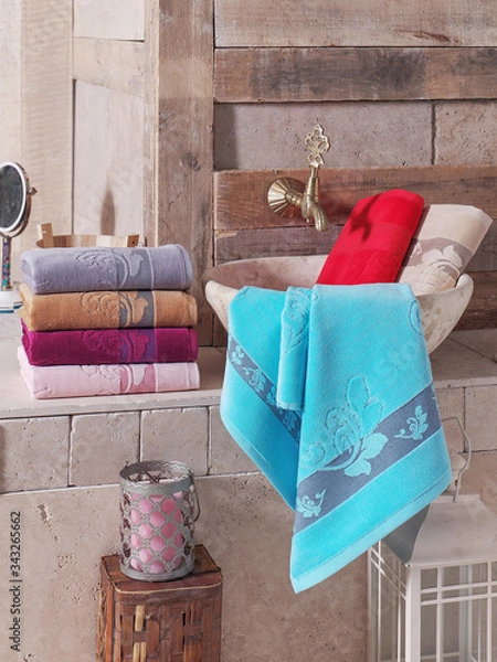 Fototapeta Stack of clean soft colorful towels. 