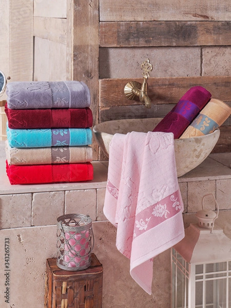 Fototapeta Stack of clean soft colorful towels. 