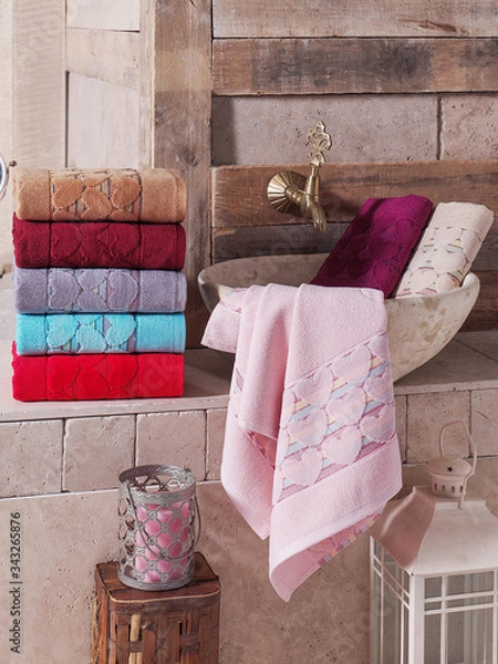 Fototapeta Stack of clean soft colorful towels. 