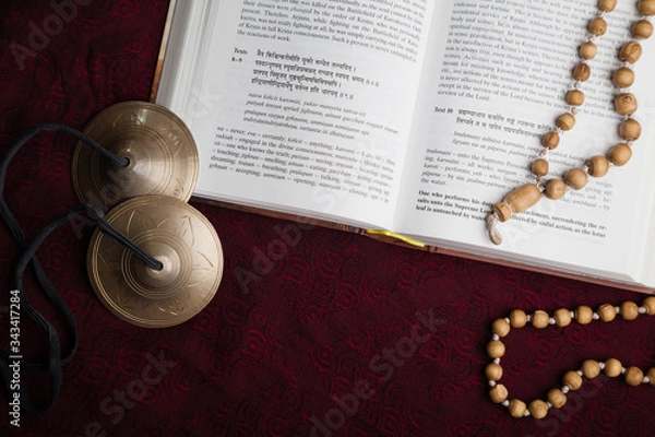 Obraz Open scripture in Sanskrit with chanting beads