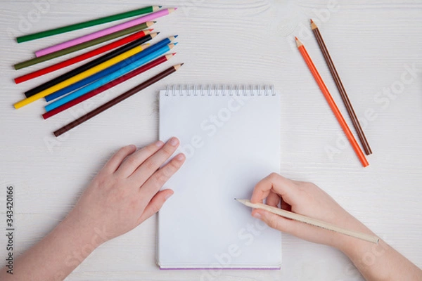 Obraz Children's hands draw with crayons