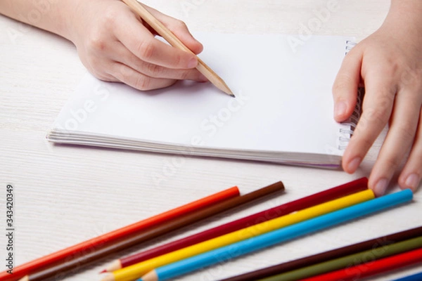 Obraz Children's hands draw with crayons