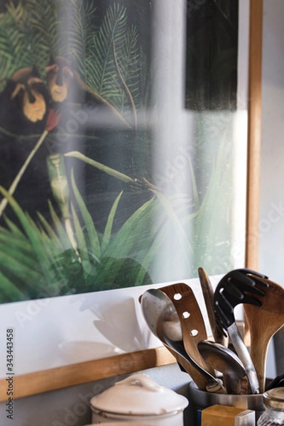 Fototapeta atmposphere close up a kitchen set of utensil like ladles and cutlery