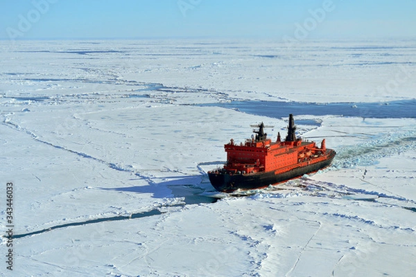 Fototapeta Red icebreaker in the middle of Arctic ocean