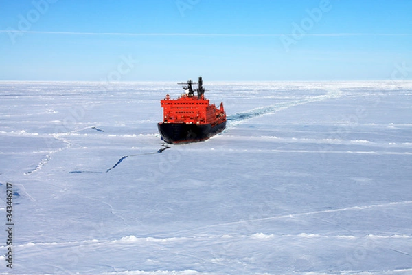 Fototapeta Red icebreaker in the middle of Arctic ocean