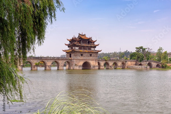 Fototapeta The Double Dragon bridge in Jianshui County, China. Constructed in 1800s with three towers and 17 archways is still hailed as a masterpiece of traditional Chinese bridge-making