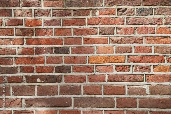 Fototapeta Old brick wall house texture with lights and shadows from sunlight