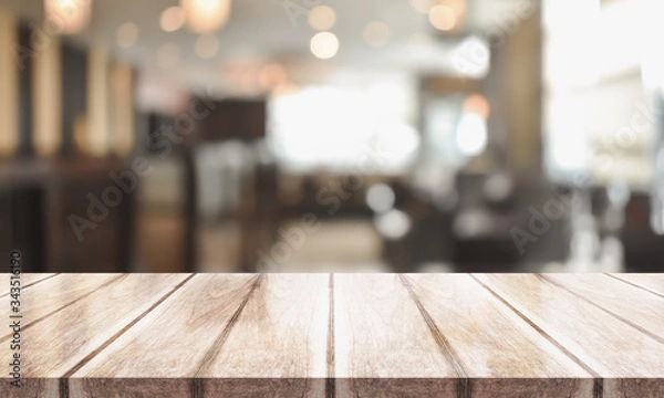 Obraz 3D Rendering, Wooden top table with bokeh light effect and blur restaurant on background, blur background