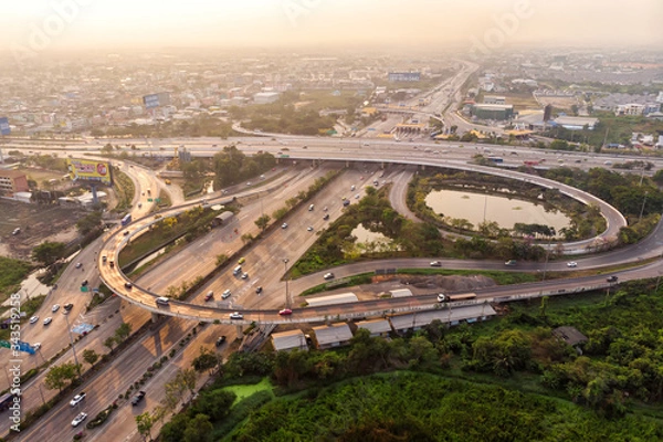 Obraz Bangkok,Thailand-February 09,2020 : aerial view of highway at sunrise with PM2.5 in the air.