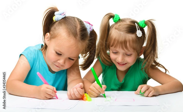 Obraz Two little girls draw with markers