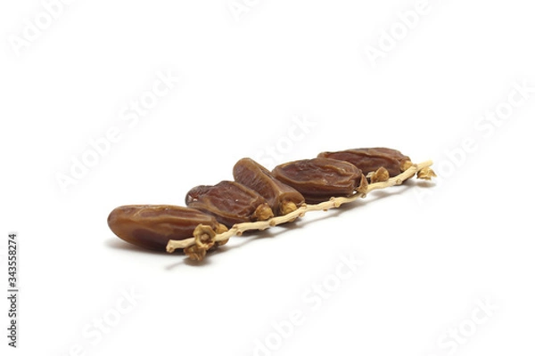 Fototapeta Tunisian dates (kurma tunisia) isolated on white background, perfect for breakfasting during ramadan