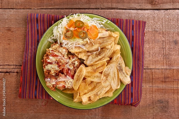 Fototapeta Comida típica Pollo con tajadas