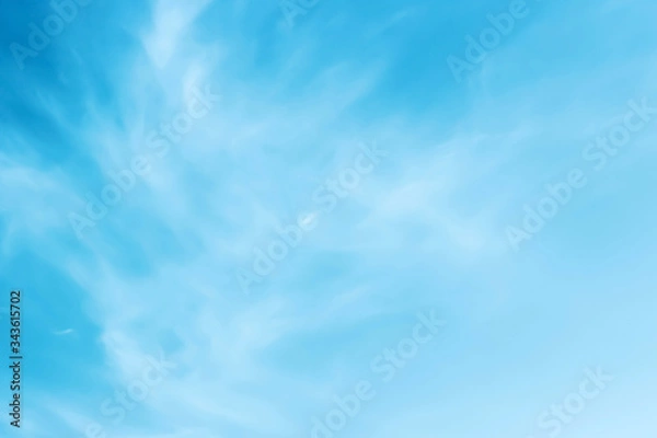 Fototapeta white clouds on a background of blue sky, abstract background.