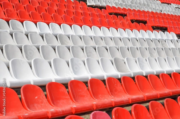 Fototapeta Empty seats in the stands of the arena