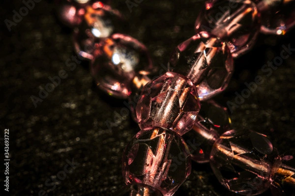 Fototapeta 
faceted beads in different colors with different colors