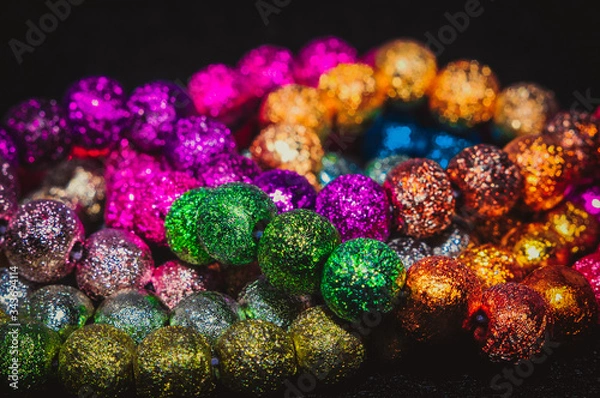 Obraz 
multicolored christmas beads with boke in the background