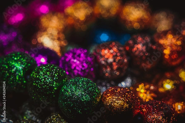 Obraz 
multicolored christmas beads with boke in the background