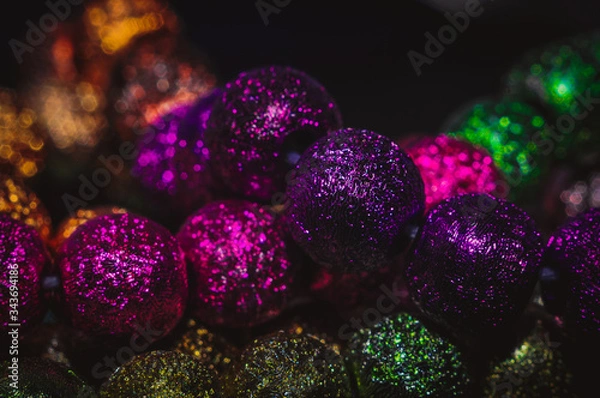 Obraz 
multicolored christmas beads with boke in the background