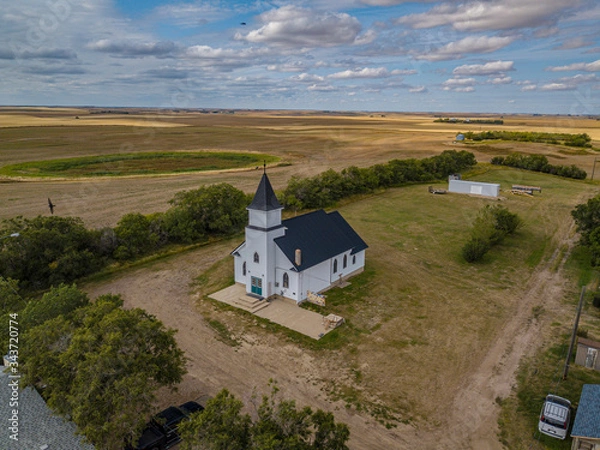 Obraz Chapel church in the middle of nowhere at the side of a small remote  village drone photography 
