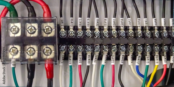 Fototapeta Terminal block. Industrial power case. Close-up of a power supply electrical wiring and Terminal block.