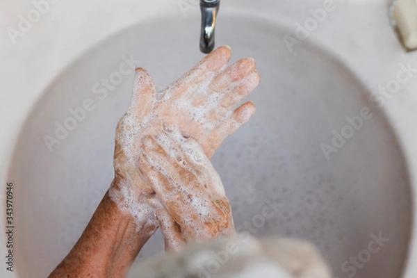 Obraz washing hands with soap