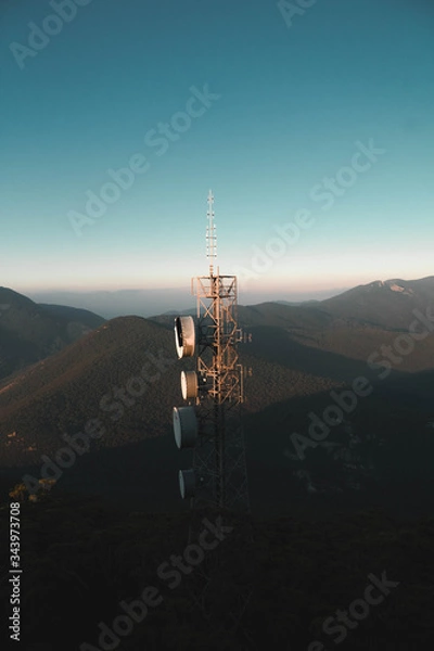 Fototapeta telecommunication tower on a hill